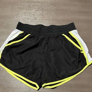Woman’s running shorts with pockets. Size large (fits more like a medium).